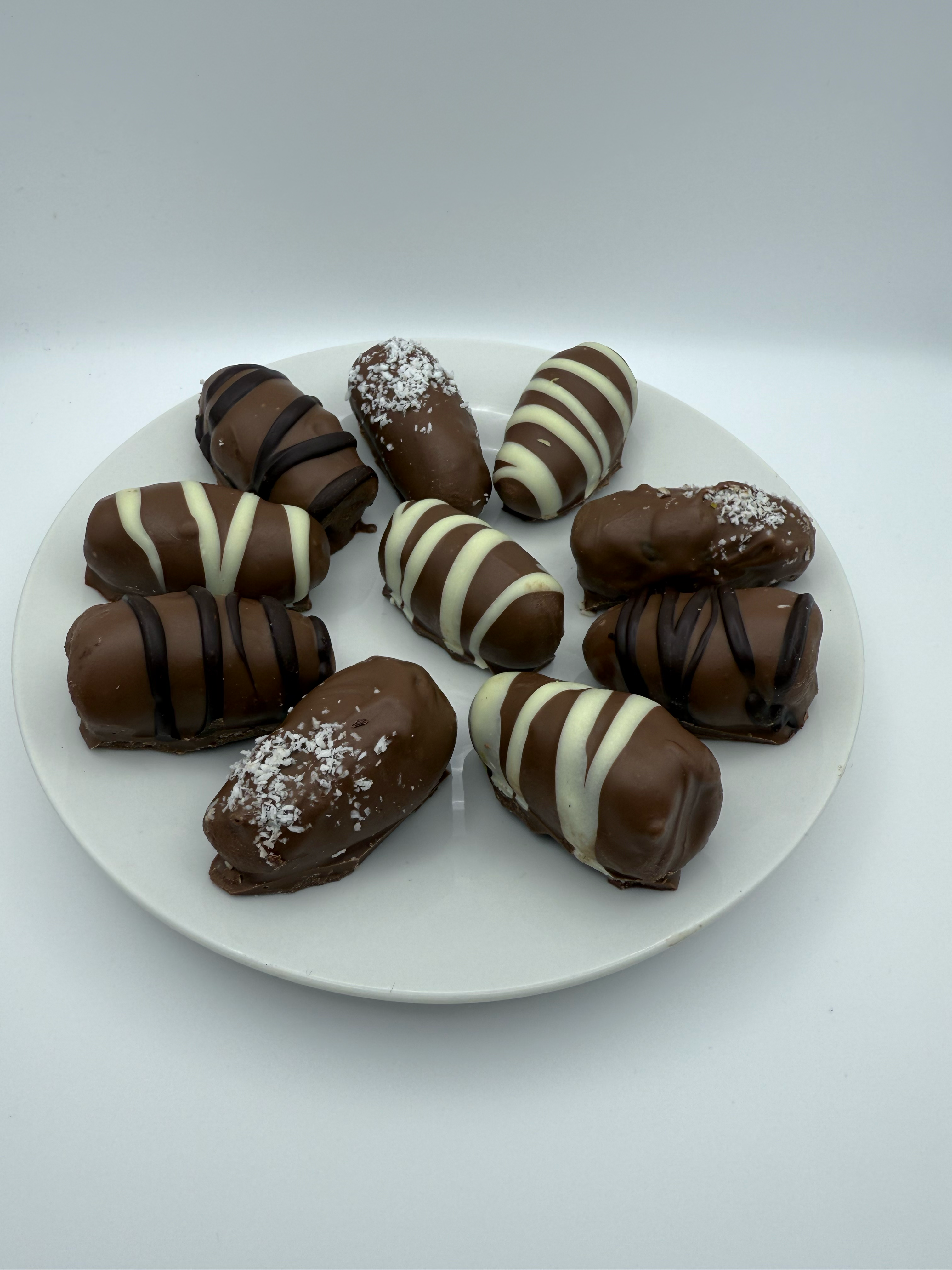 Dates with Almonds coated in Chocolate
