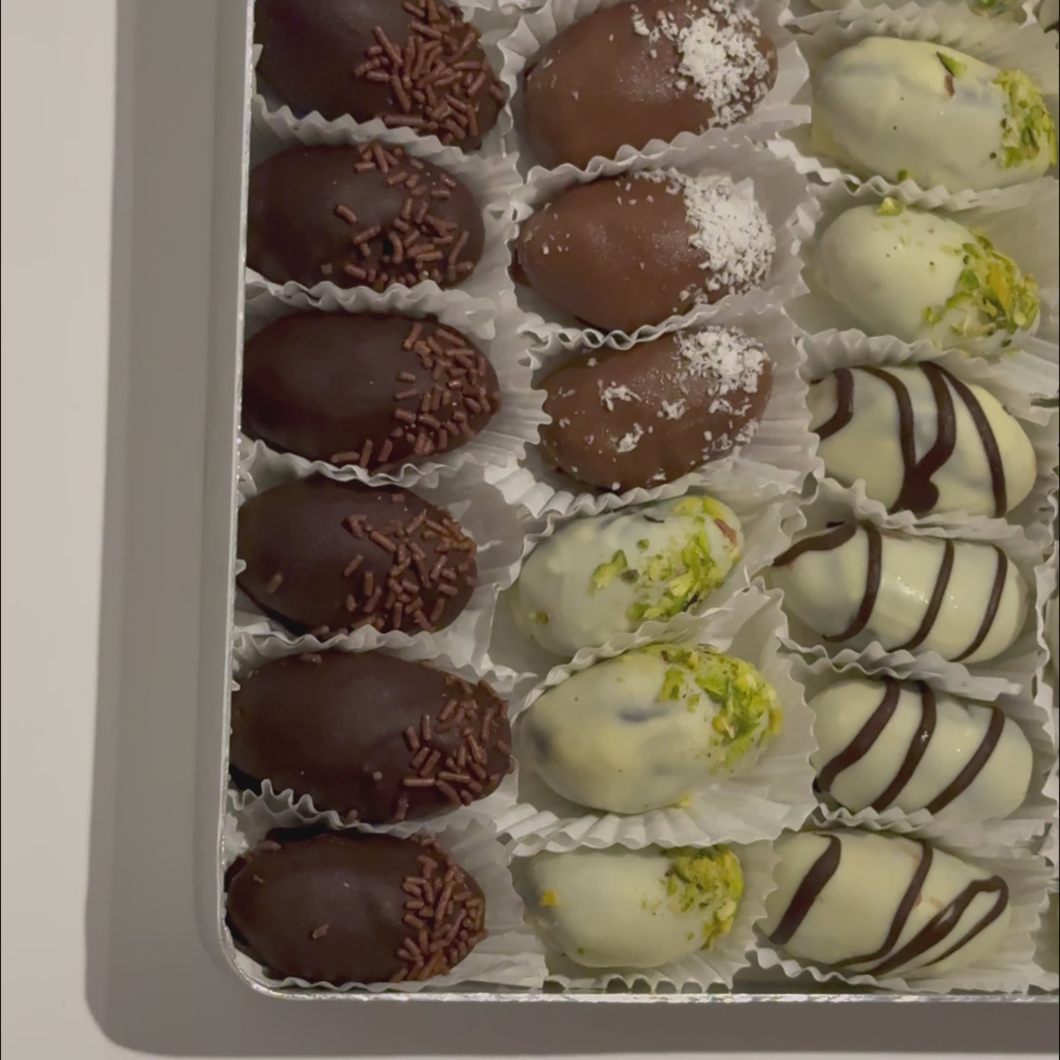 Dates with Almonds coated in Chocolate